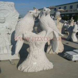 Scultura di uccello in granito beige