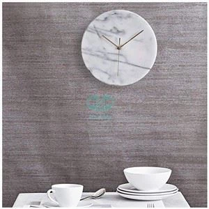Orologio da parete in marmo bianco
